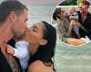 London Goheen shares a kiss with her husband Reece Hawkins as they reunite
