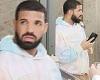 Drake takes call outside his Miami hotel... after beginning the year on ...
