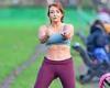 Apprentice star Amy Anzel, 48, shows off her abs in a sports bra during park ...