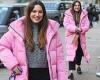 Kelly Brook puts on a stylish display in a playful bubblegum pink coat and ...