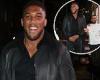 Anthony Joshua looks chipper as he enjoys a night out with pals in the capital