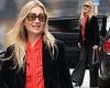 Kate Moss cuts a trendy figure in striped red shirt and black trousers as she ...