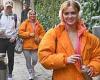 Strictly's Maisie Smith catches the eye in an orange jacket as she giggles with ...