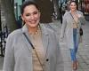 Kelly Brook nails winter chic in grey wool coat and denim jeans as she heads to ...