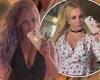 Britney Spears debuts purple hair in low-cut minidress as she continues feud ...