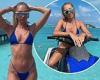 Megan McKenna shows off her sizzling physique in a TINY blue bikini