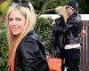 Avril Lavigne wears all-black leather while getting affectionate with Mod Sun ...
