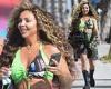 Jesy Nelson puts on a busty display in green crop top and camouflage shorts as ...
