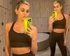 Ashley Roberts gives a glimpse at her midriff in gym locker room