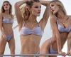 Joy Corrigan puts on a sizzling display in a skimpy lilac-colored bikini as she ...