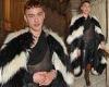 Olly Alexander showcased his sensational sense of style in a cape as he attends ...