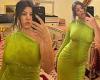 Kourtney Kardashian goes braless in a green figure-hugging dress in snaps from ...
