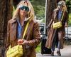 Phoebe Burgess makes a fashion statement in speed-dealer sunglasses and a brown ...