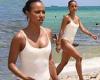 Saturday 7 May 2022 11:26 PM Karrueche Tran shows off her toned figure in a white swimsuit as she hits the ... trends now