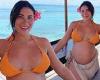 Sunday 8 May 2022 02:08 AM The Bachelor's Noni Janur flaunts her blossoming baby bump in an orange bikini trends now