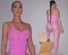 Tuesday 24 May 2022 04:10 AM Kim Kardashian slips her famous curves into a racy pink thong bodysuit trends now