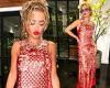 Saturday 4 June 2022 04:55 PM Rita Ora cuts a stylish figure in scarlet and gold patterned gown and classic ... trends now