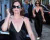 Wednesday 22 June 2022 01:32 AM Ruth Wilson looks chic in a plunging black satin gown and white mules trends now