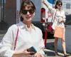 Tuesday 2 August 2022 11:45 PM Anne Hathaway showcases long legs in a  pair of cream colored shorts as she ... trends now