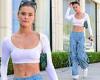 Monday 26 September 2022 11:23 PM Nina Agdal shows off her toned abs in a tiny white crop top trends now
