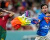 Protester runs onto World Cup field flying pride flag and wearing protest shirt