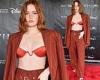 Tuesday 29 November 2022 09:48 AM Ellie Bamber flashes her bra in an orange striped suit at screening of Disney+ ... trends now