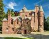 Pink turreted 11-bed house set in 31 acres with its own LOCH hits the market ... trends now