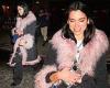 Dua Lipa cuts a stylish figure in a quirky pink fur-trimmed coat as she steps ... trends now