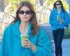 Kaia Gerber looks cozy in blue sweater and tight leggings while grabbing her ... trends now