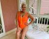 Denise Welch exhibits her enviable physique in a zip-up orange swimsuit trends now