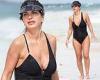 Teresa Giudice, 50, sizzles in a plunging black swimsuit as she hits the beach ... trends now
