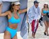 Nadia Bartel shows off her ample cleavage in a bikini and snuggles beau Peter ... trends now