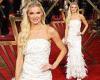 Abbie Quinnen stuns in a glamorous feather gown at the star-studded Babylon ... trends now