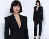 Shanina Shaik puts on a busty display in plunging blazer at the Givenchy ... trends now