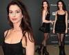 Anne Hathaway shows off her endless legs in a black mini dress at the 2023 ... trends now