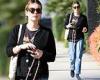 Emma Roberts cuts a casual figure in blue jeans and a chic cardigan as she ... trends now