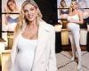 Pregnant Ashley James cradles her growing baby bump in a white jumpsuit trends now