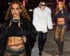 Rita Ora showcases her abs in black crop top before wrapping up in faux fur ... trends now