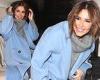 Cheryl wraps up in a turtleneck jumper and powder blue coat trends now