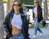 Rita Ora flashes her washboard abs in a stylish white crop top in LA trends now