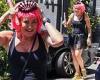 Michelle Bridges sports a cropped pink wig and gold wings as she attends fancy ... trends now