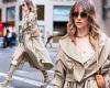 Suki Waterhouse wows in a chic trench coat and platform boots as she steps out ... trends now