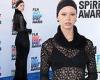 Mia Goth showcases her curves in form-fitting black lace dress at Film ... trends now
