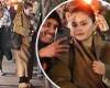 Selena Gomez looks cozy in a camel-colored coat as she pauses to pose with a ... trends now