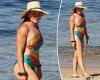 Michelle Bridges shows off her bikini body in a swimsuit as she hits the beach ... trends now