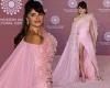 Penelope Cruz looks sensational in a thigh-split feathered gown with a dramatic ... trends now