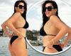 Imogen Thomas shows off her stunning figure in a triangle black bikini trends now