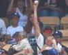 LA Man goes viral for catching foul ball during game while holding baby and ... trends now