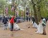 Volunteers and street staff get out the bin bags to tidy up after crowning of ... trends now