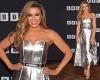 Dannii Minogue catches the eye in metallic silver gown at premiere of her new ... trends now